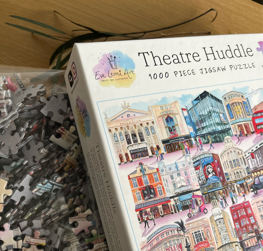 A 1000 piece jigsaw puzzle of West End Theatres, painted by Eve Leoni Art. A perfect christmas gift for Musical theatre lovers.