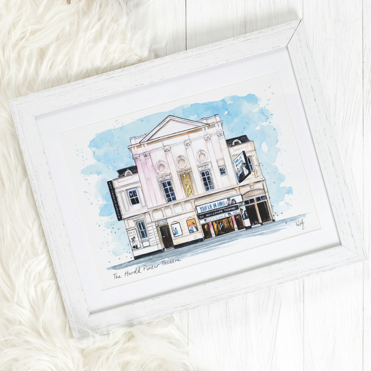 An original watercolour painting of the Harold Pinter Theatre in the West End, featuring Your Lie in April the Musical.