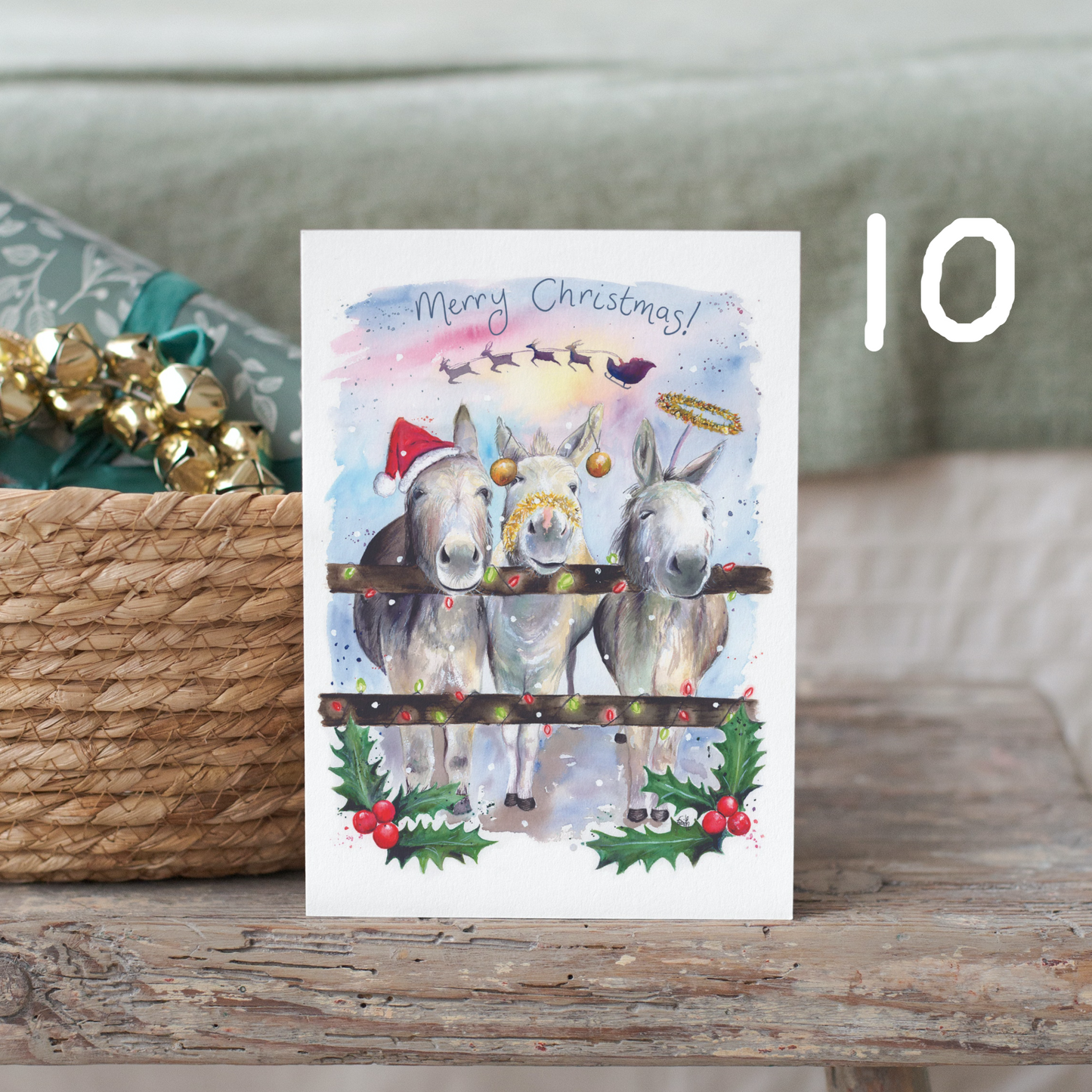 A watercolour painting of three Christmas donkeys painted by Grimsby artist, Eve Leoni Smith.