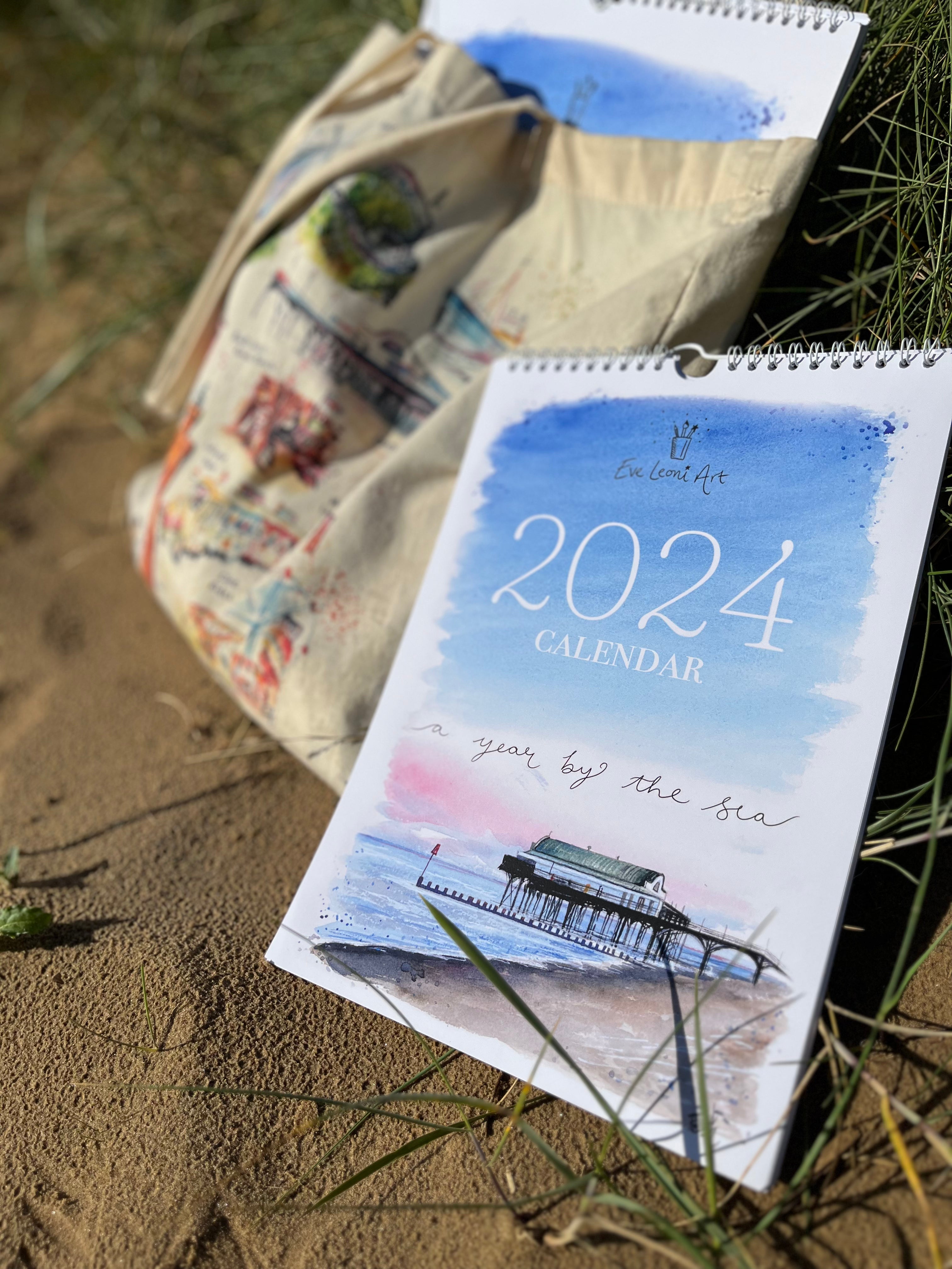 2024 calendar by local Grimsby artist, Eve Leoni Smith, featuring watercolour artwork of Cleethorpes beach, Humberston Fitties, Cleethorpes donkeys and the Cleethorpes pier. 