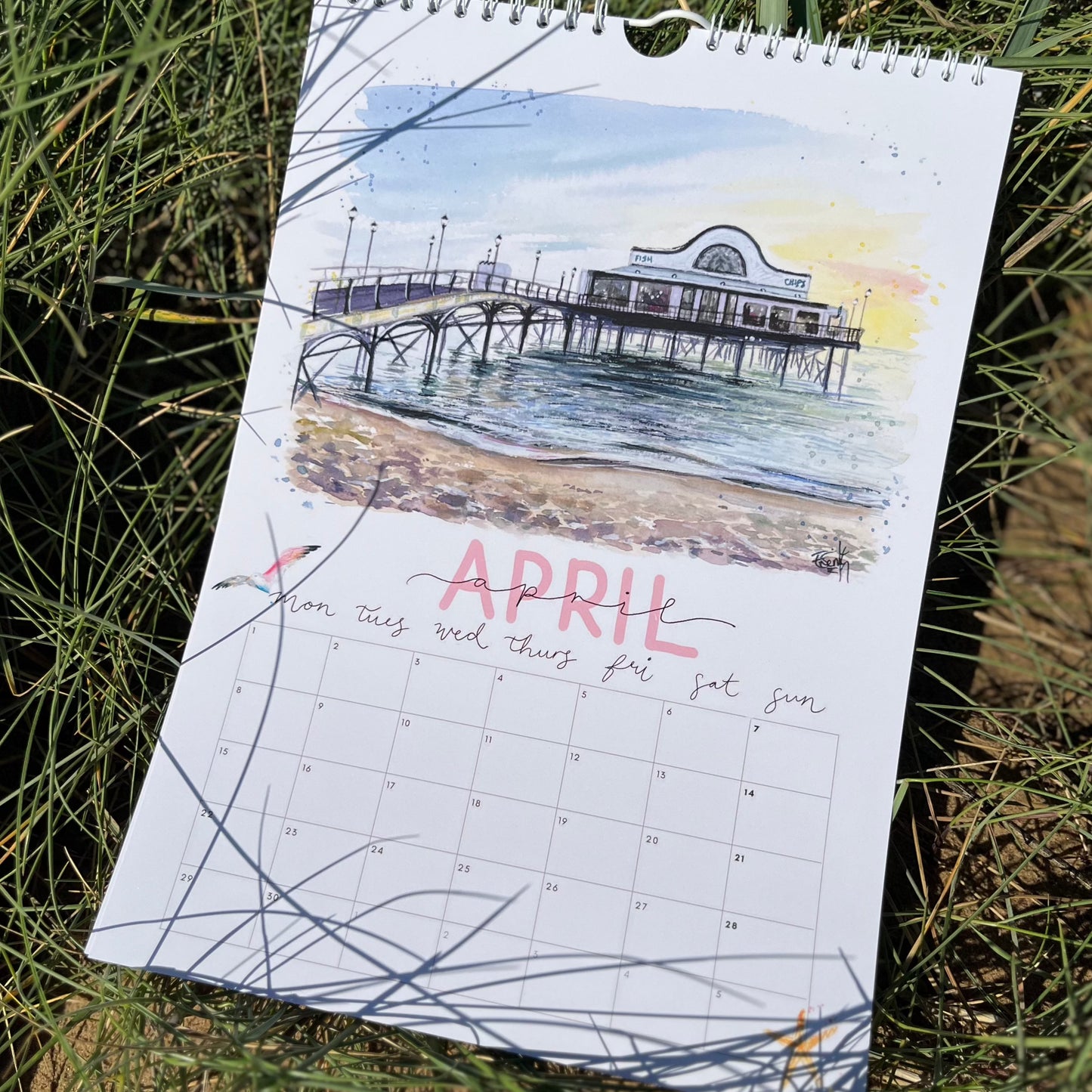 2024 calendar featuring watercolour artwork of Cleethorpes Pier by Eve Leoni Art.