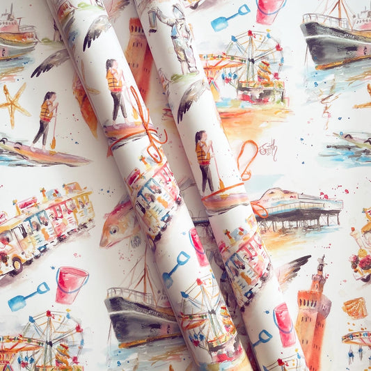 Luxury gift wrap featuring watercolour illustrations of local landmarks in Grimsby and Cleethorpes such as the Dock Tower and Cleethorpes Pier by Eve Leoni Smith.