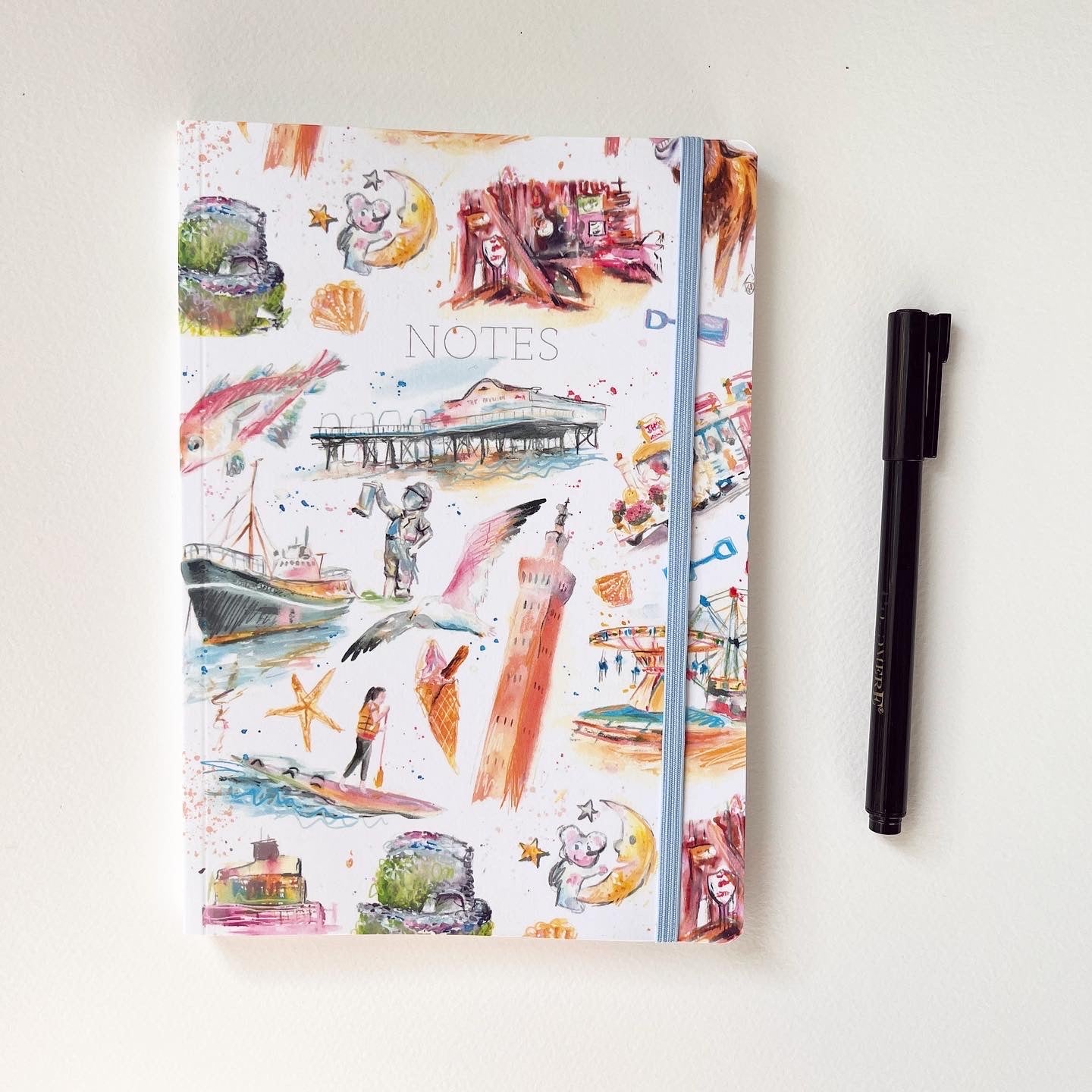 A luxury softcover notebook featuring illustrations of local landmarks in Grimsby and Cleethorpes by local artist, Eve Leoni Smith. 