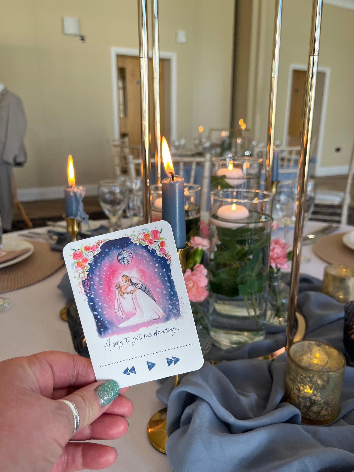 A unique song request card as part of this luxury bespoke wedding stationery suite by Eve Leoni Art. Venue styling in the background is by Amy at Jack and Jill.