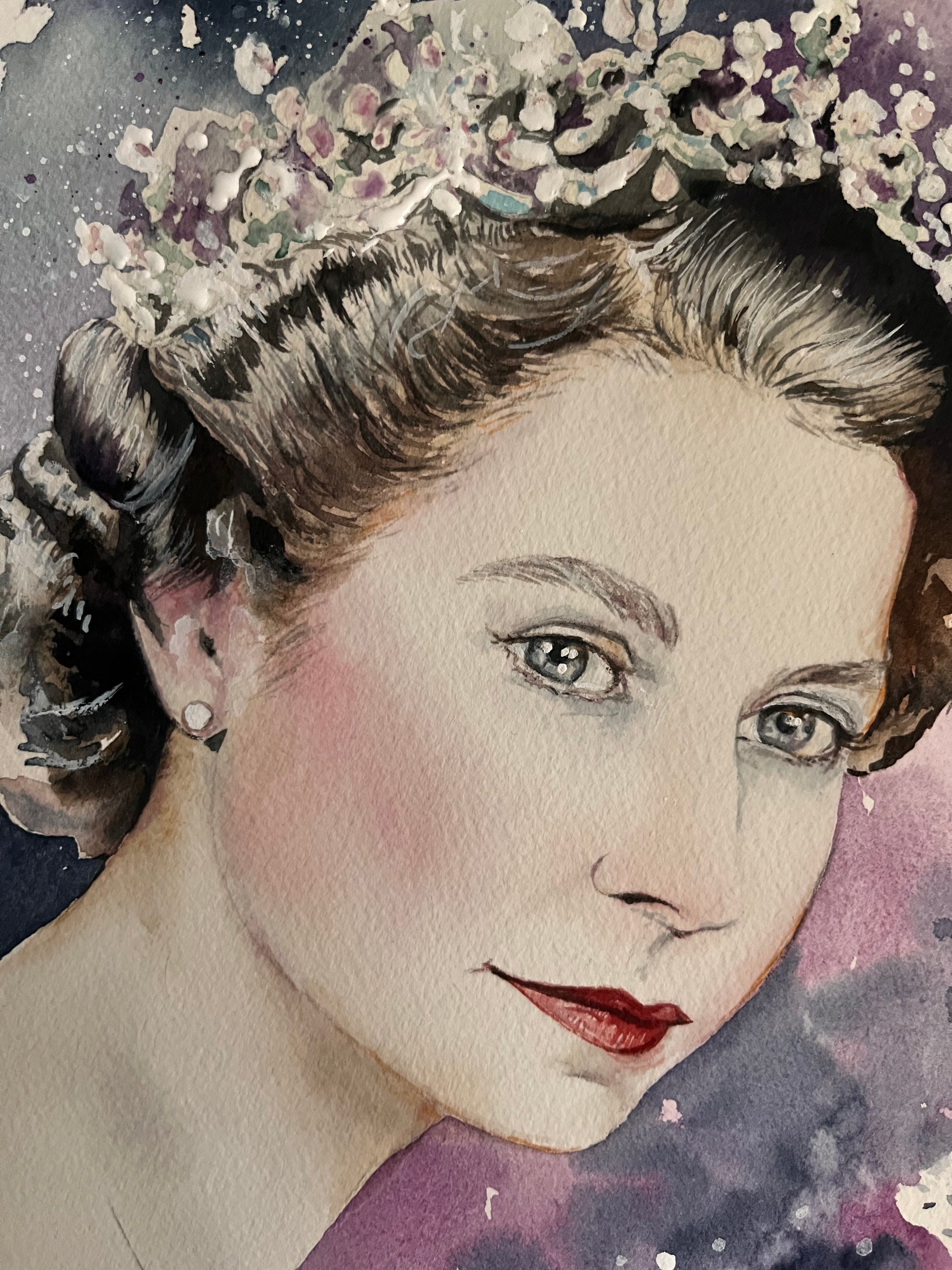 A close-up picture of the original watercolour painting of the late Queen Elizabeth II by Cleethorpes artist, Eve Leoni Smith. Limited edition prints are available to purchase. 