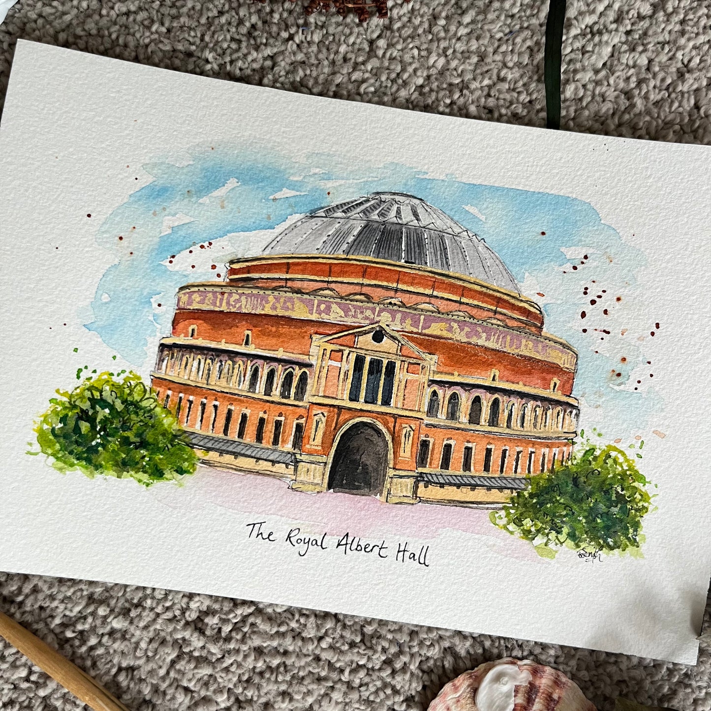 A watercolour illustration by Eve Leoni Smith of the Royal Albert Hall in London.