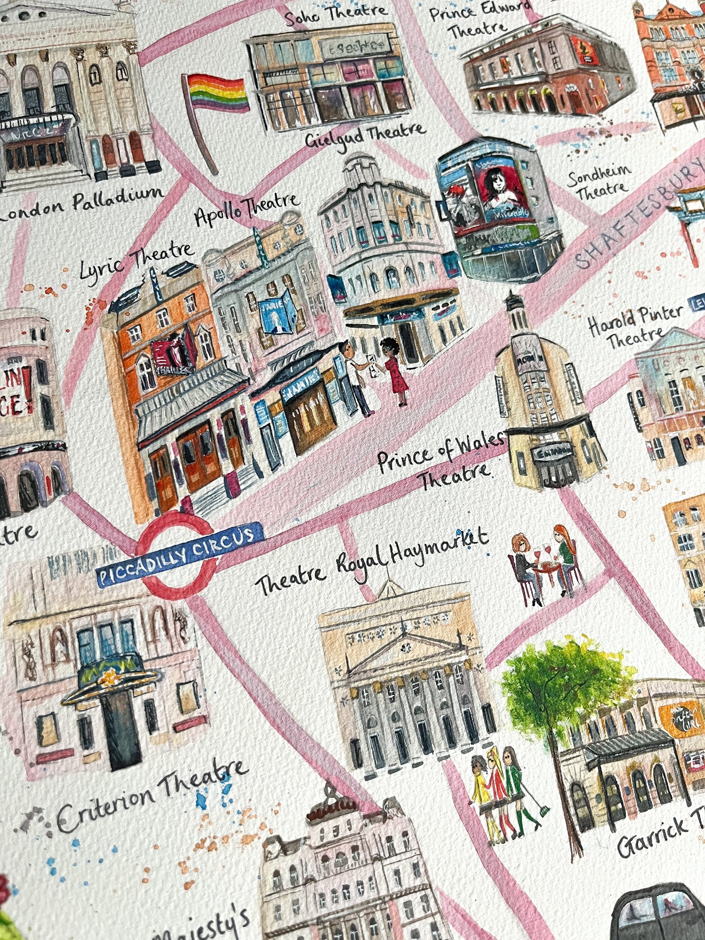Watercolour illustrations of theatres along Shaftesbury Avenue by Eve Leoni Smith as part of her map of the West End.