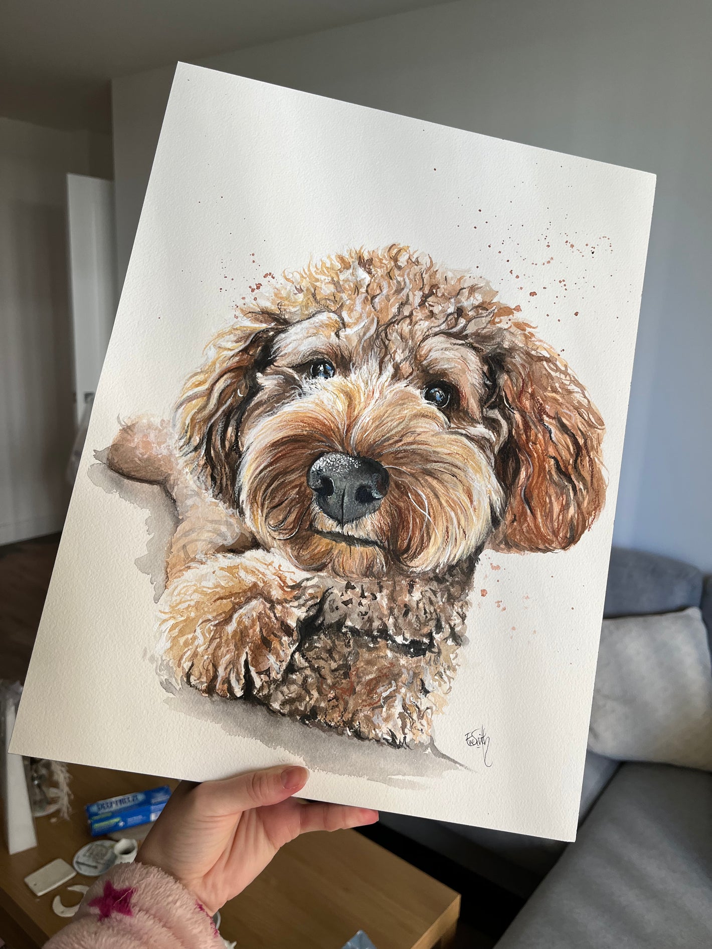 An original watercolour pet painting of a cute cockapoo by Lincolnshire artist, Eve Leoni Smith.