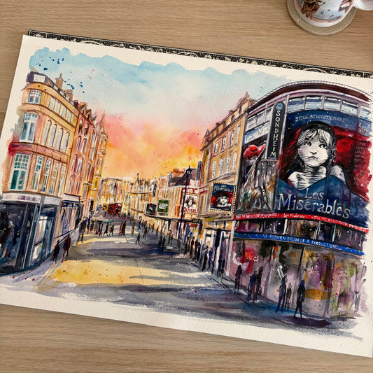 A watercolour painting by Eve Leoni of a busy Shaftesbury Avenue featuring Les Miserables at the Sondheim Theatre.