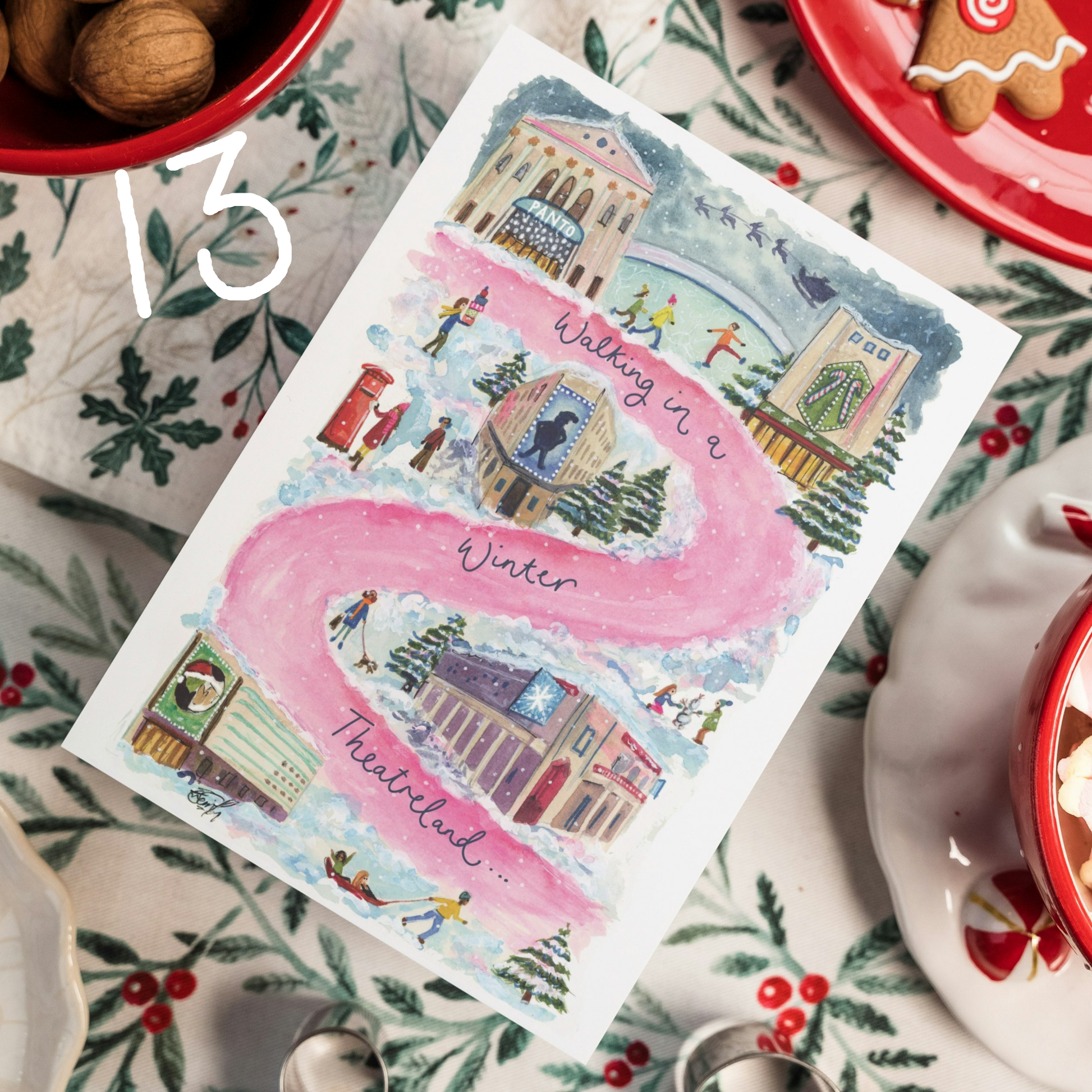 An illustrated Christmas Card of West End theatres by Eve Leoni Art saying 'Walking in a Winter Theatreland'. There are people playing in the snow and walking around this vibrant depiction of London during the winter.